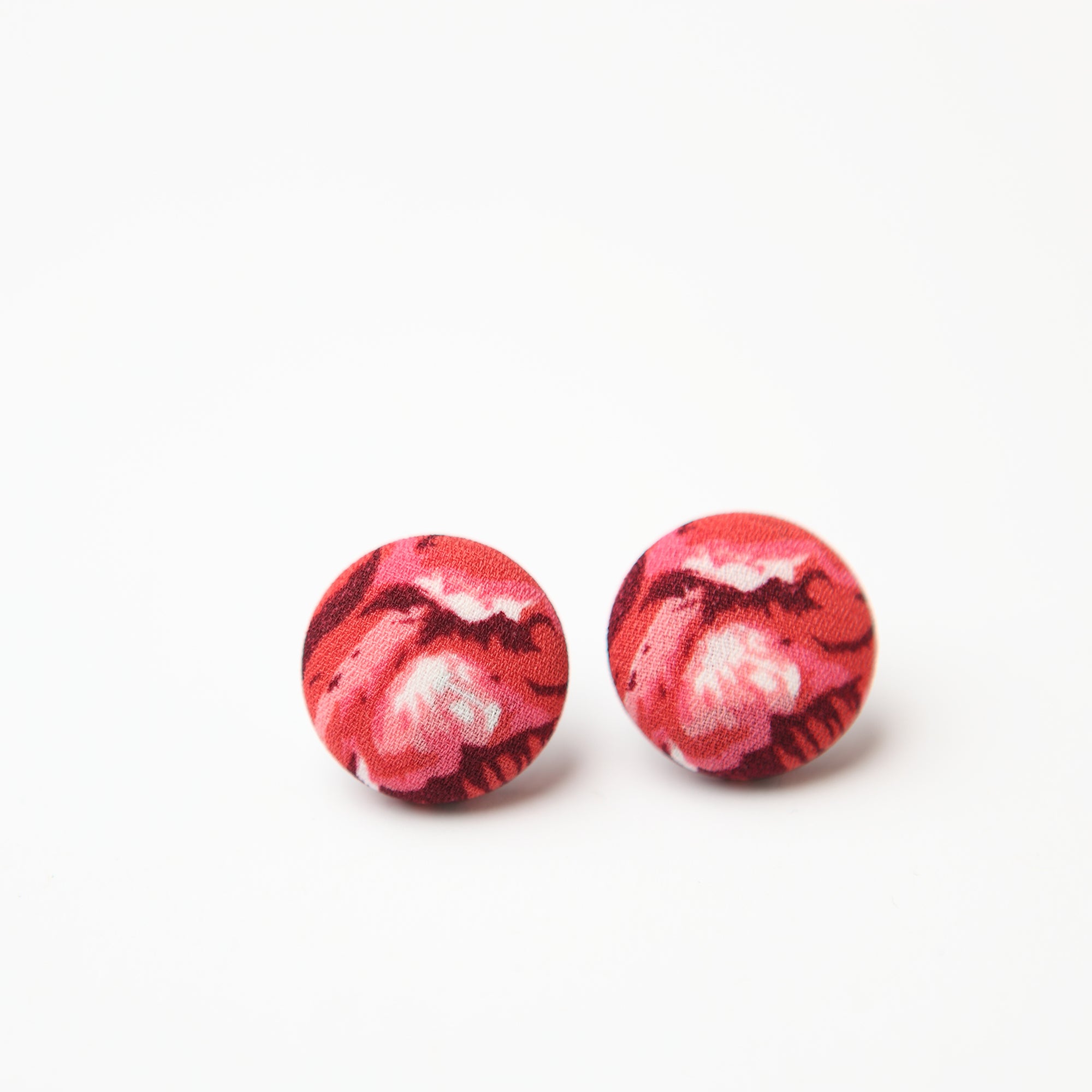 Clous d'oreilles fleurs roses
